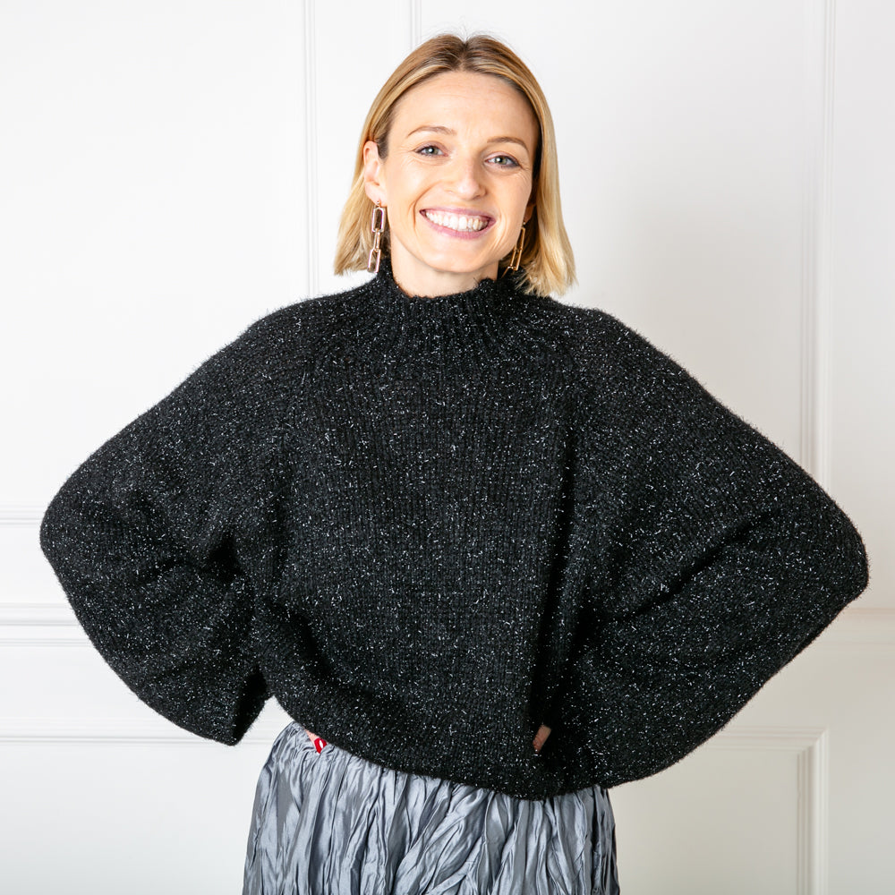 Metallic black jumper styled with the crinkle skirt. Relaxed fit and cosy.